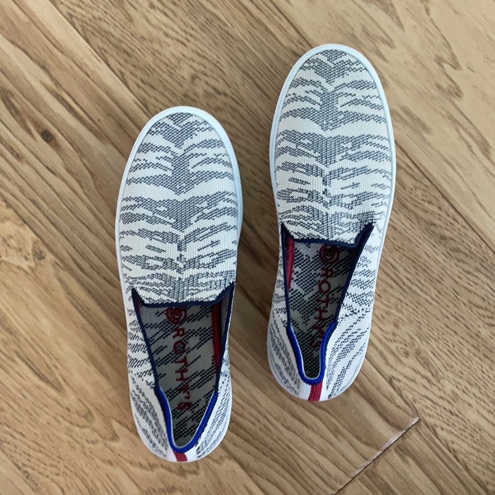 These Rothys sneakers look and feel brand new. Machine washable.